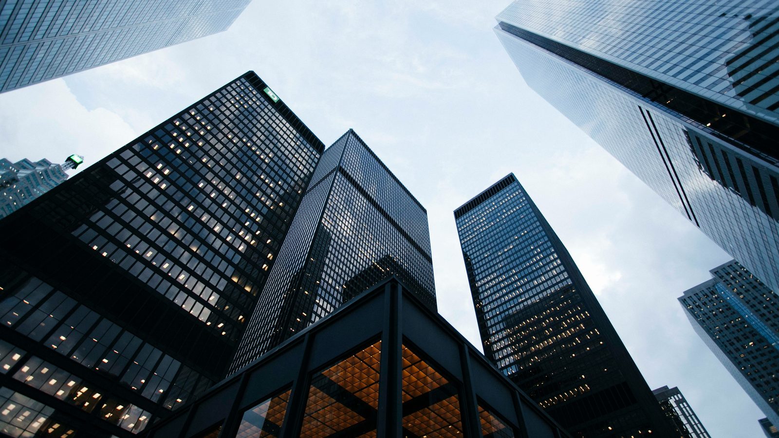 Looking up at corporate glass towers